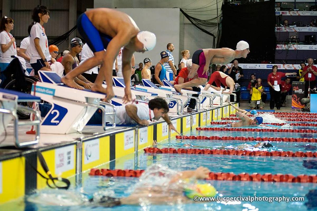 Swimmers begin their race