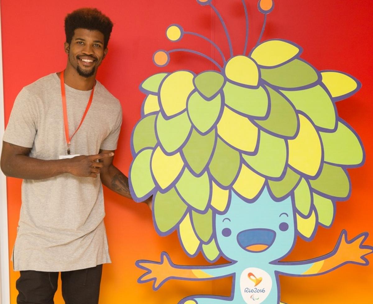 Rchard Browne poses with Rio 2016 Paralympic Games mascot Tom.