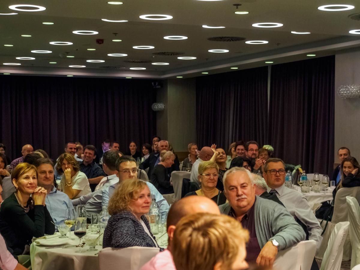 People sitting on tables in a room