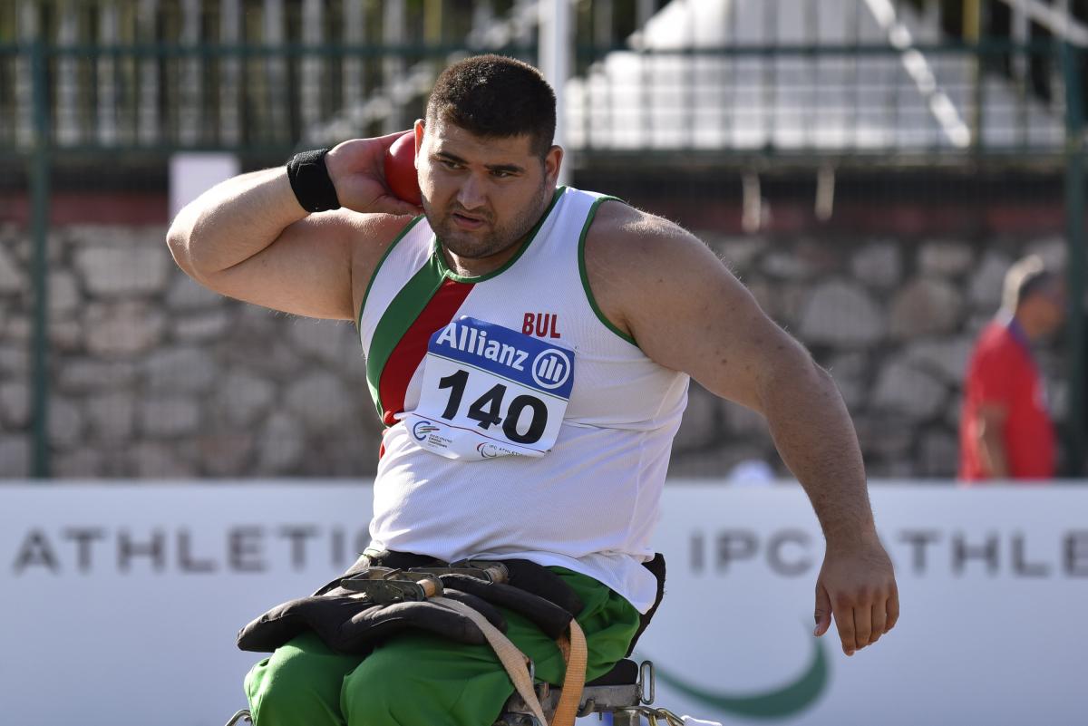 Man doing shot put