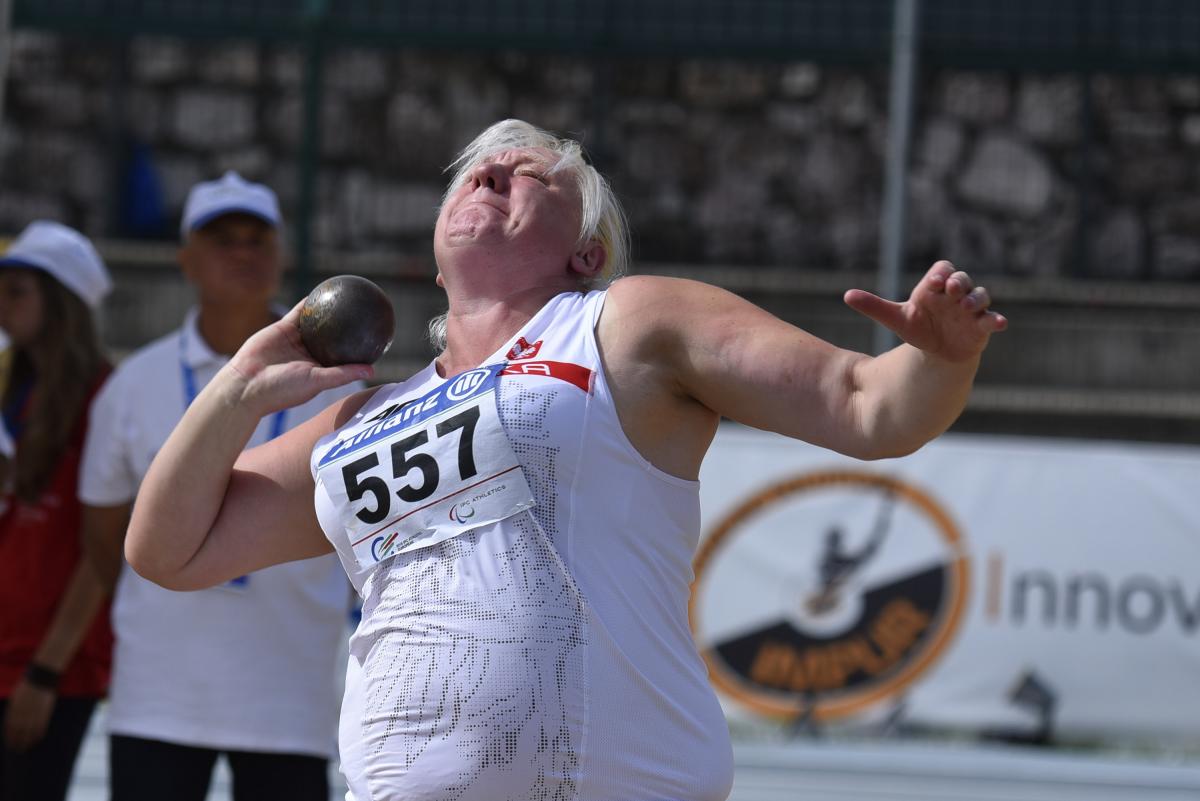 Woman during a shot put