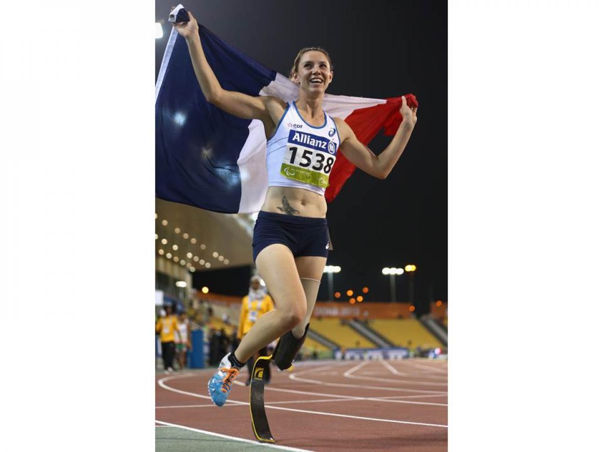 Marie-Amelie Le Fur of France celebrates winning the women's 400m T44 final during the Evening Session at the IPC Athletics World Championships in Doha, Qatar.