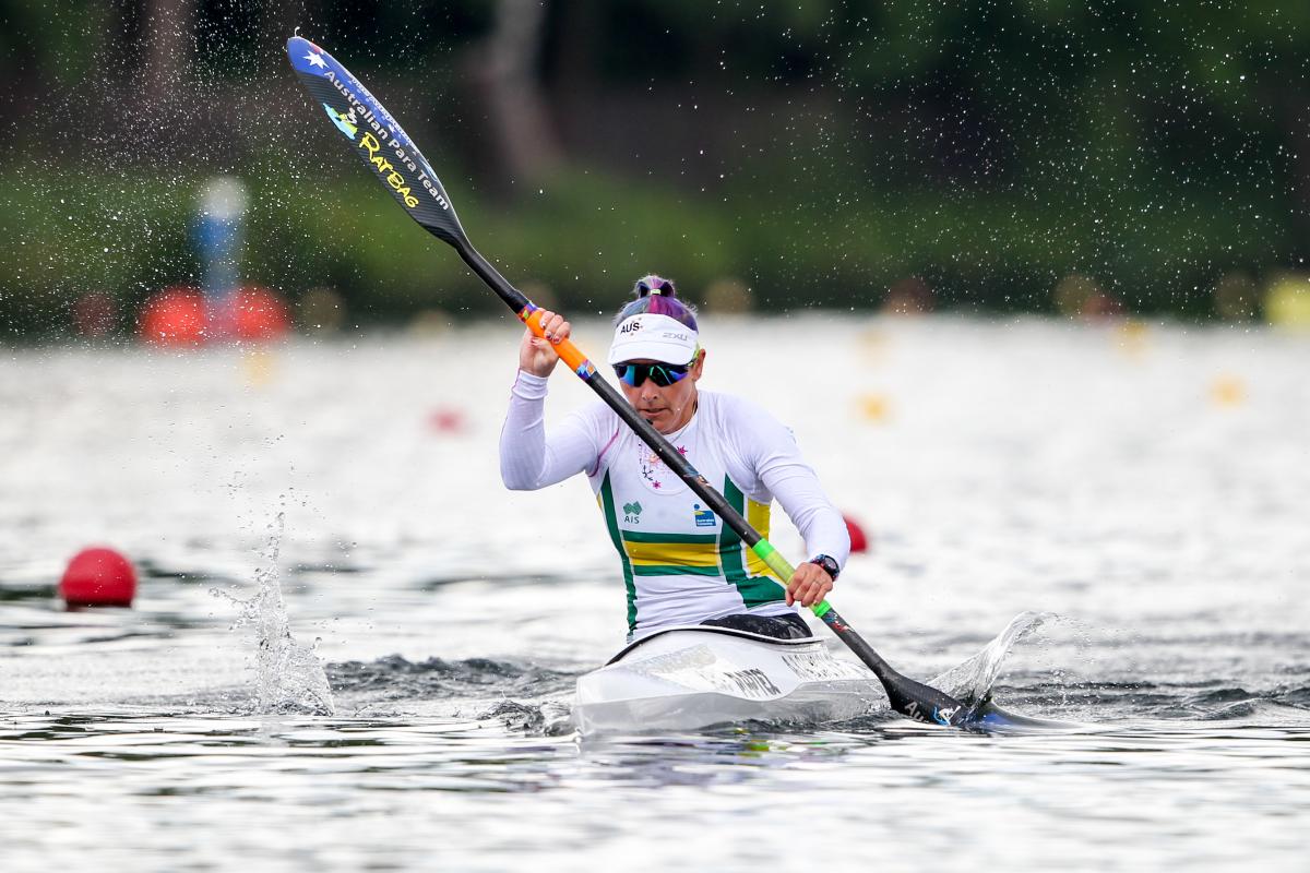 Woman paddles in kayak