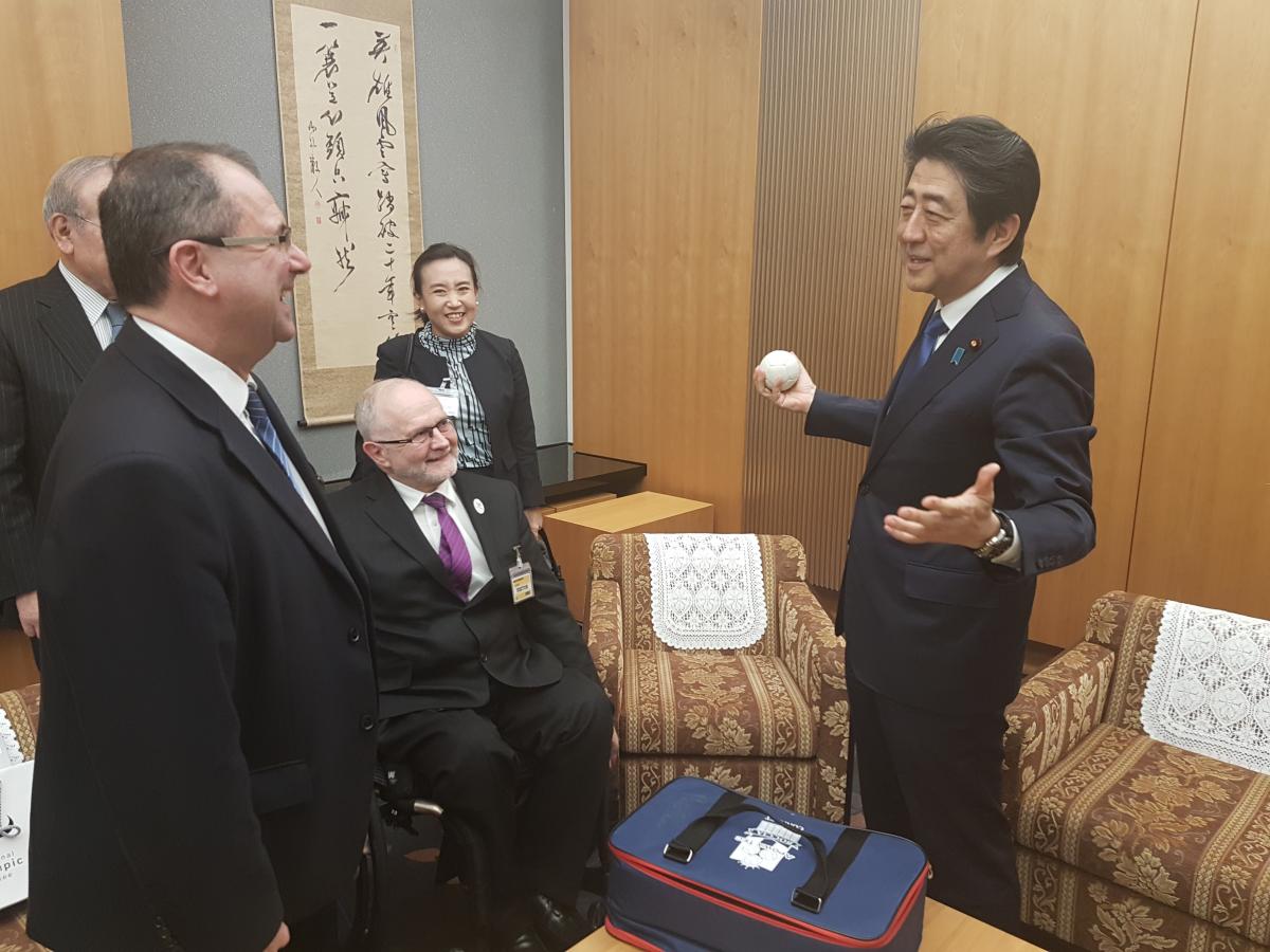 Japan's Prime Minister Abe chats with IPC President Sir Philip Craven and IPC CEO Xavier Gonzalez during a meeting in February 2017.