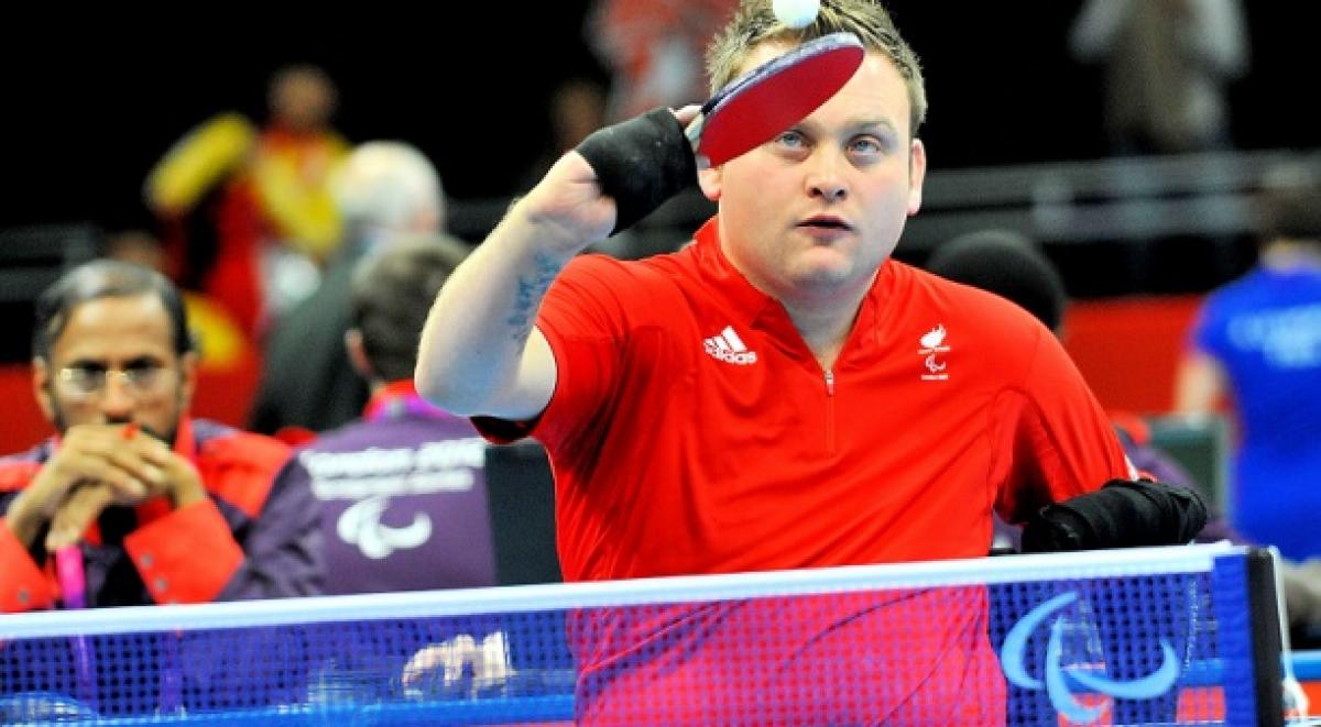 Upper body of man playing table tennis