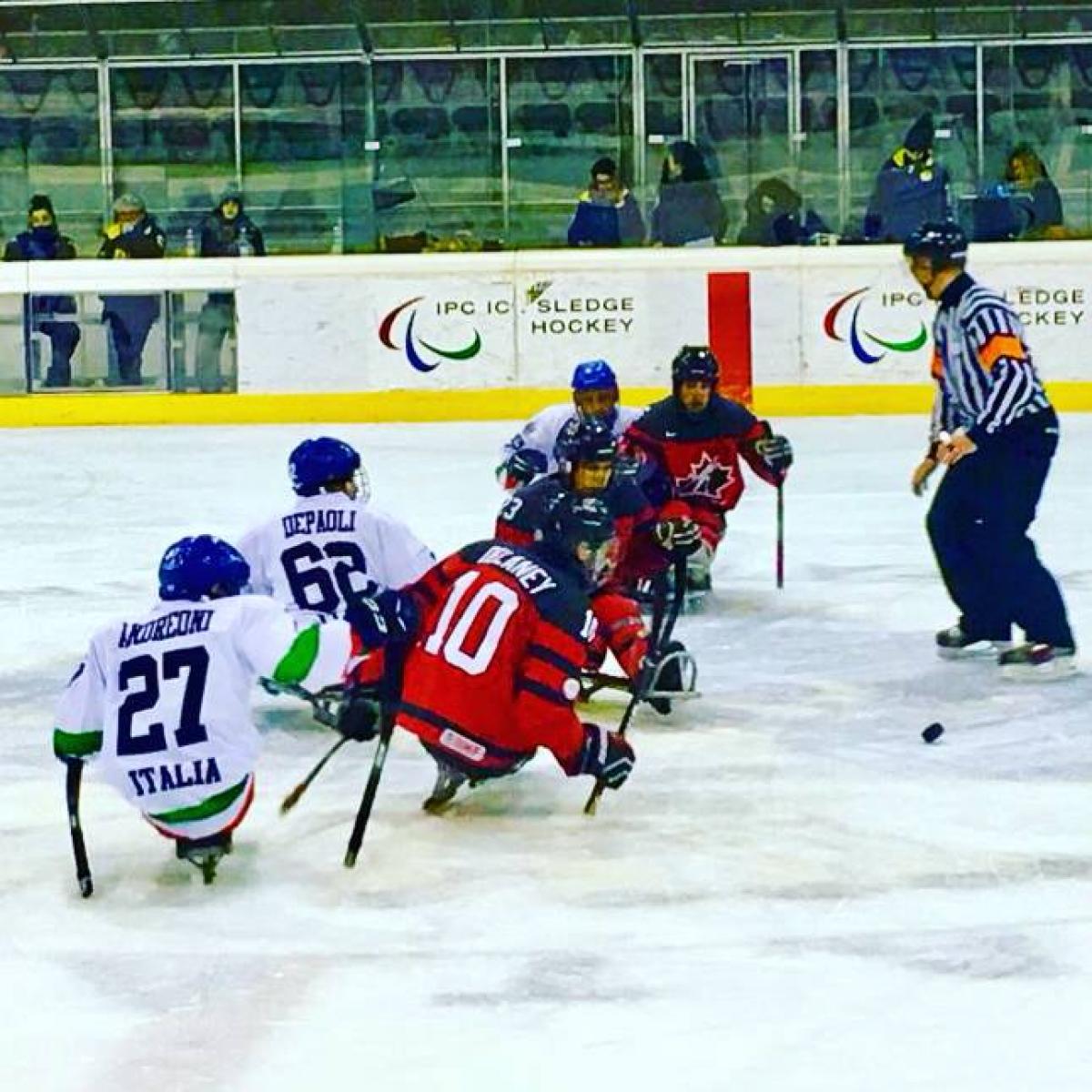 Para ice hockey players on the ice