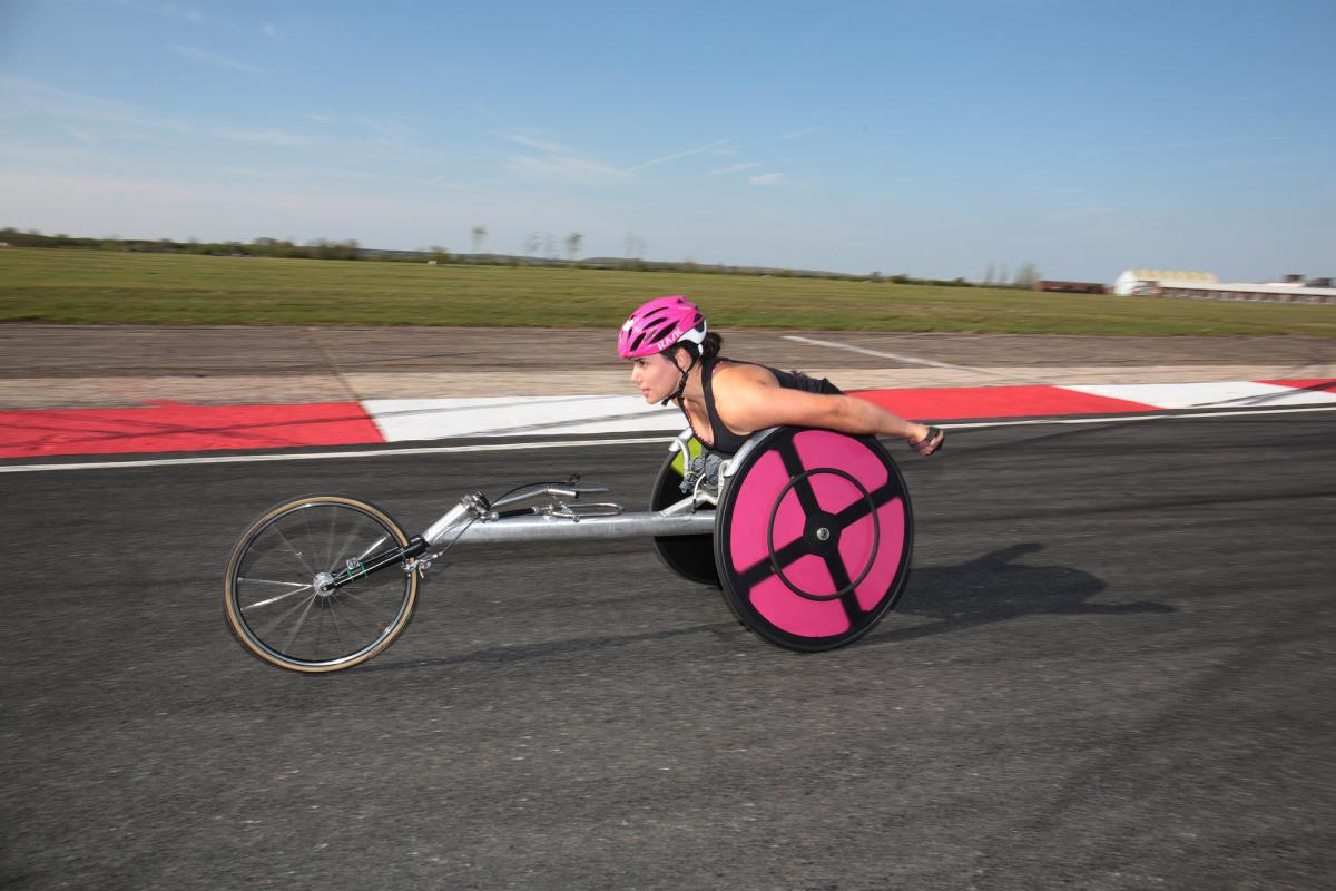 Woman in racing chair