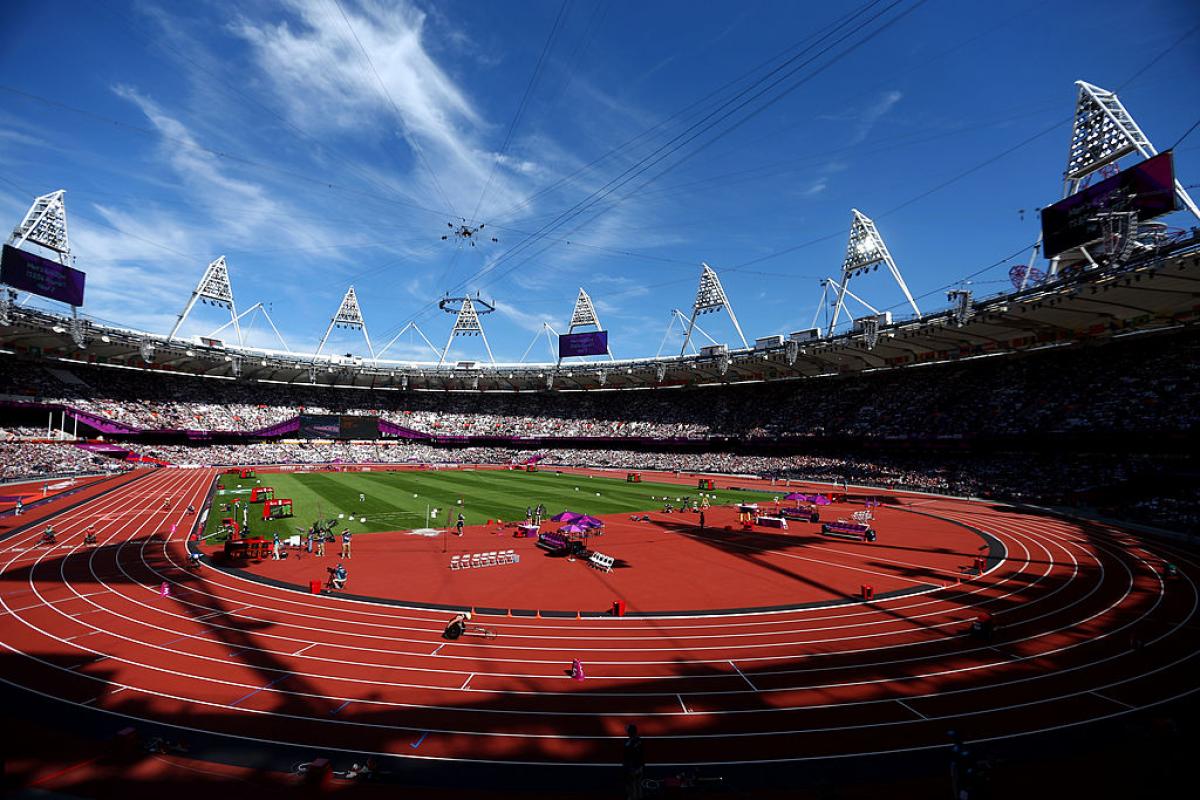 a wide shot of a stadium with fans watching