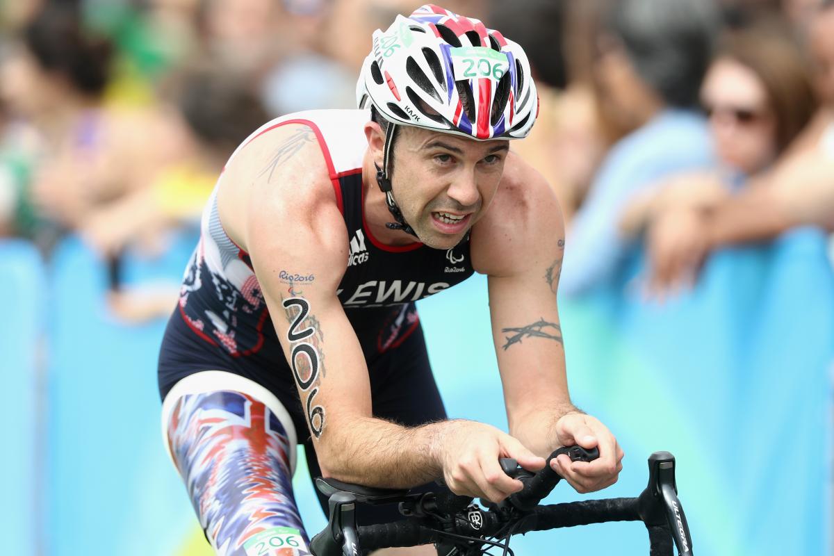 a male Para triathlete on his bike