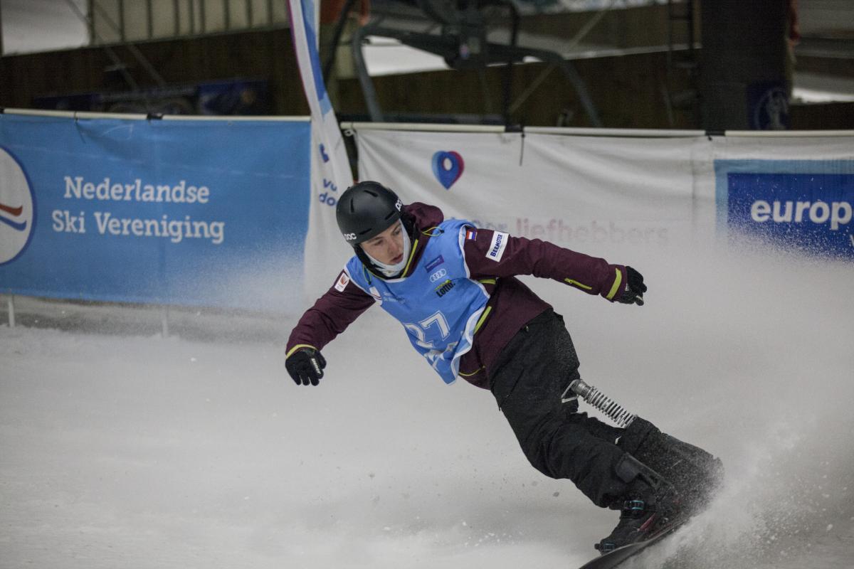 a male Para snowboarder 