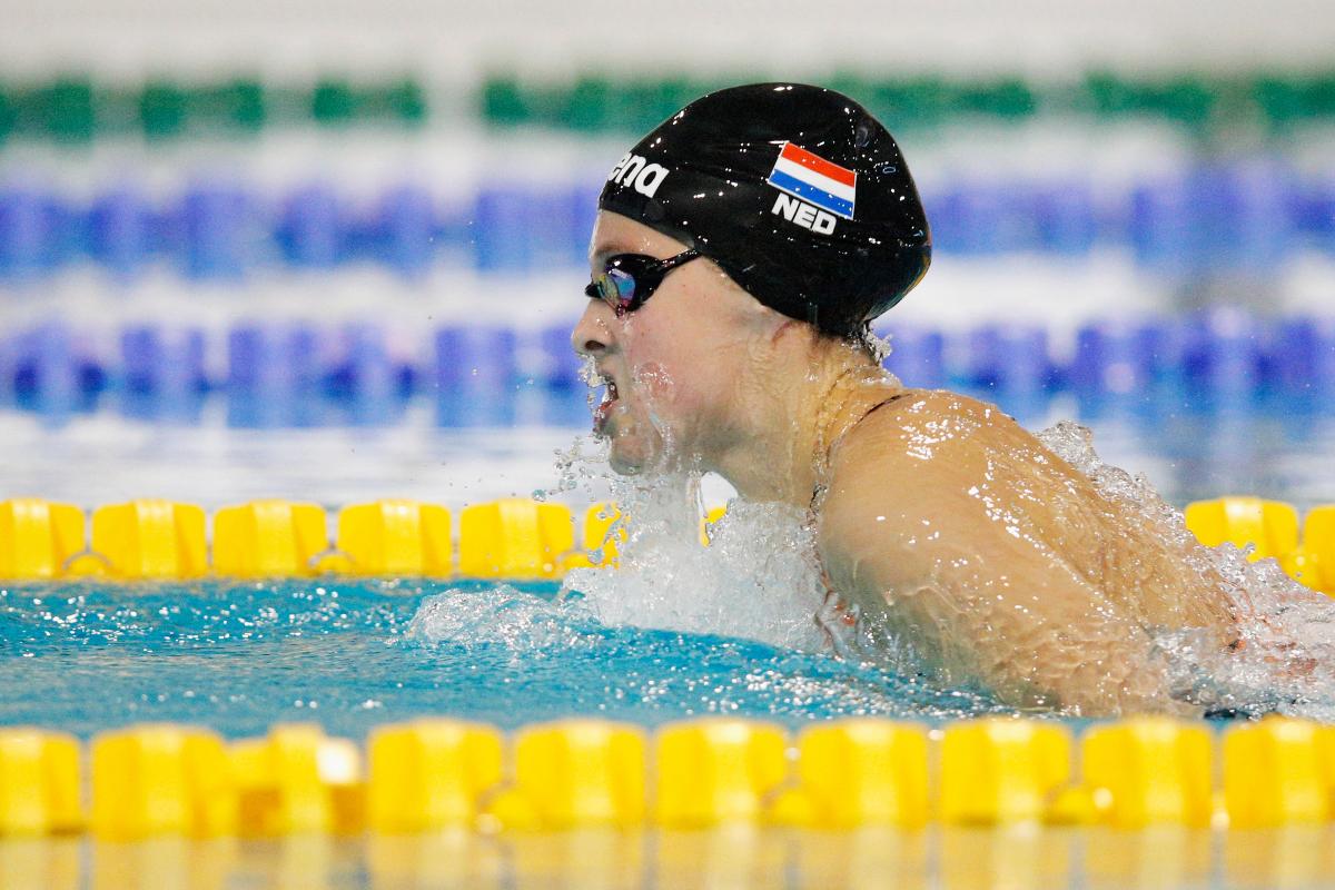 a female Para swimmer in the water