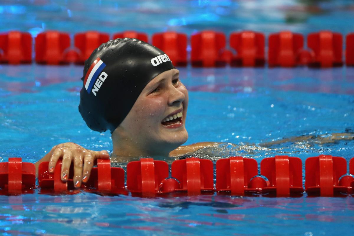 a female Para swimmer in the water