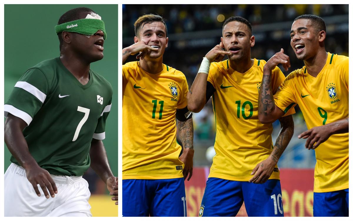 a male blind footballer and three male able-bodied footballers celebrating a goal