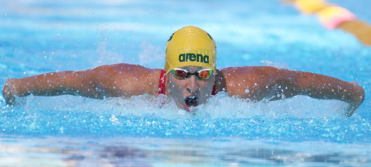 male Para swimmer Taylor Corry doing the butterfly stroke