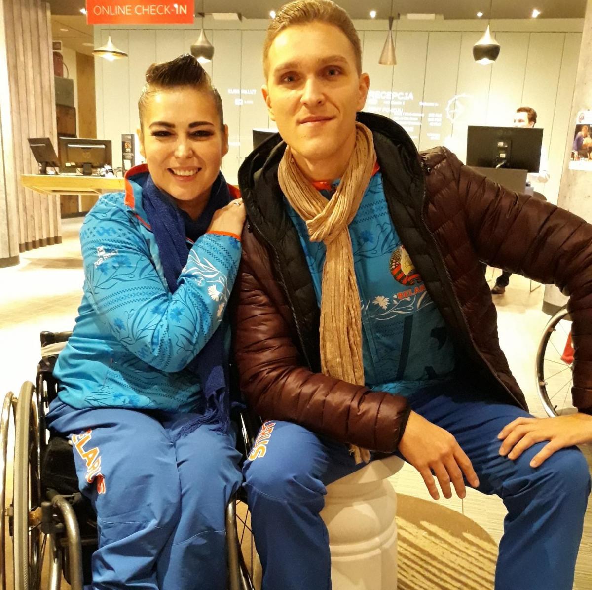 female Para dancer Hanna Harchakova and male Para dancer Roman Usmanov sitting together